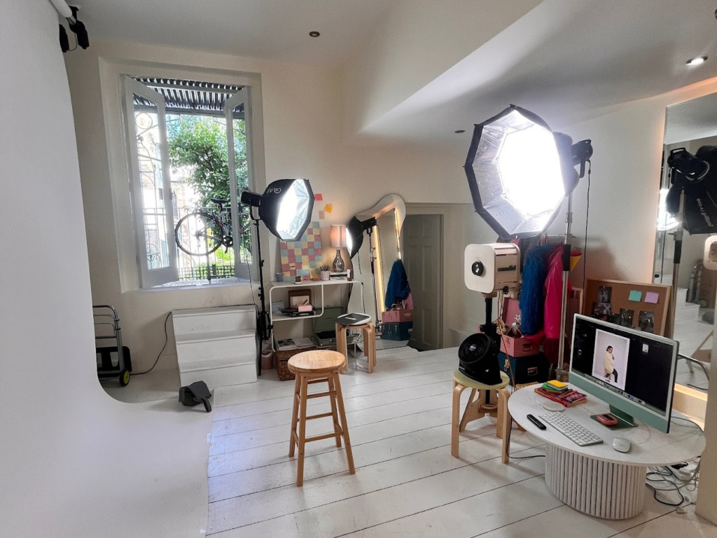 Inside the Candid Studios self-portrait studio, with lighting rigs, props and a remote-trigger camera set-up and no photographer needed