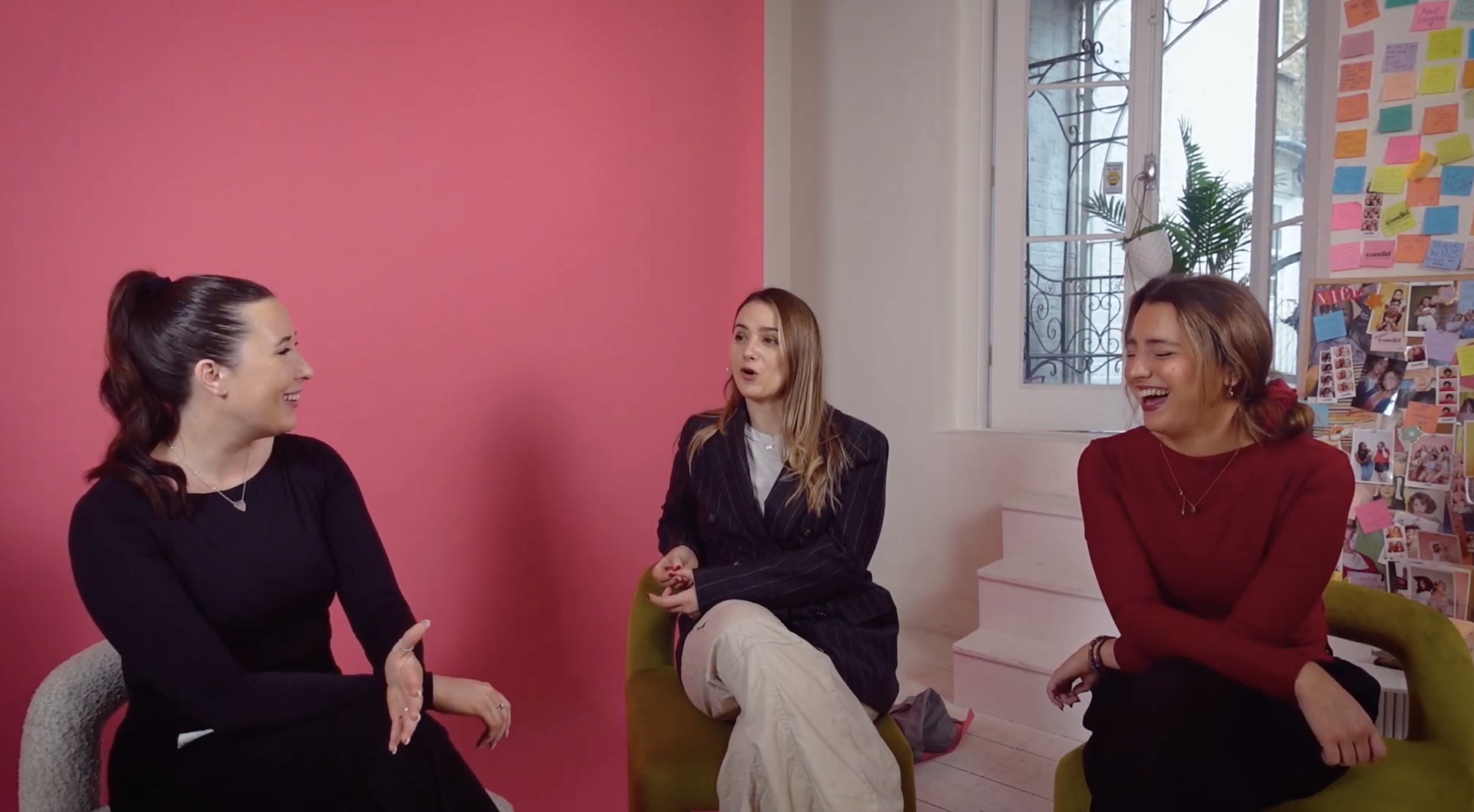 Aimee and Lily Barrett, founders of Candid Studios, in conversation with a member of the striveX team inside their studio